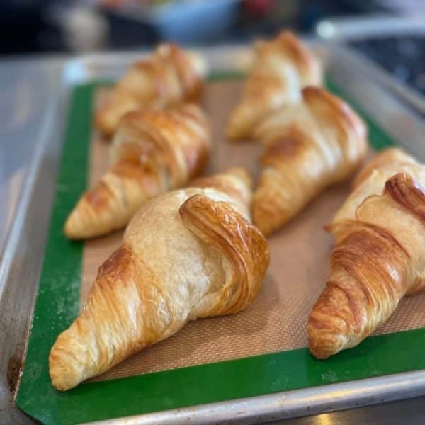 Croissants image of six fresh baked croissants at 5350 the Pourhouse